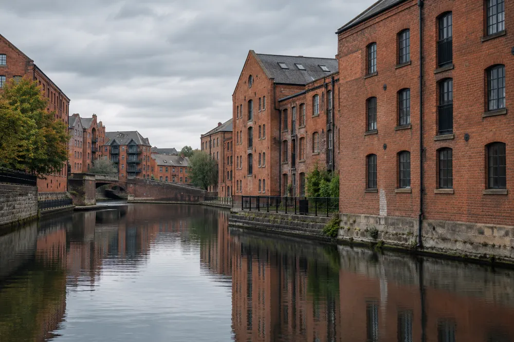 Canalside brick architecture evoking the setting of Nottingham commercial workplaces